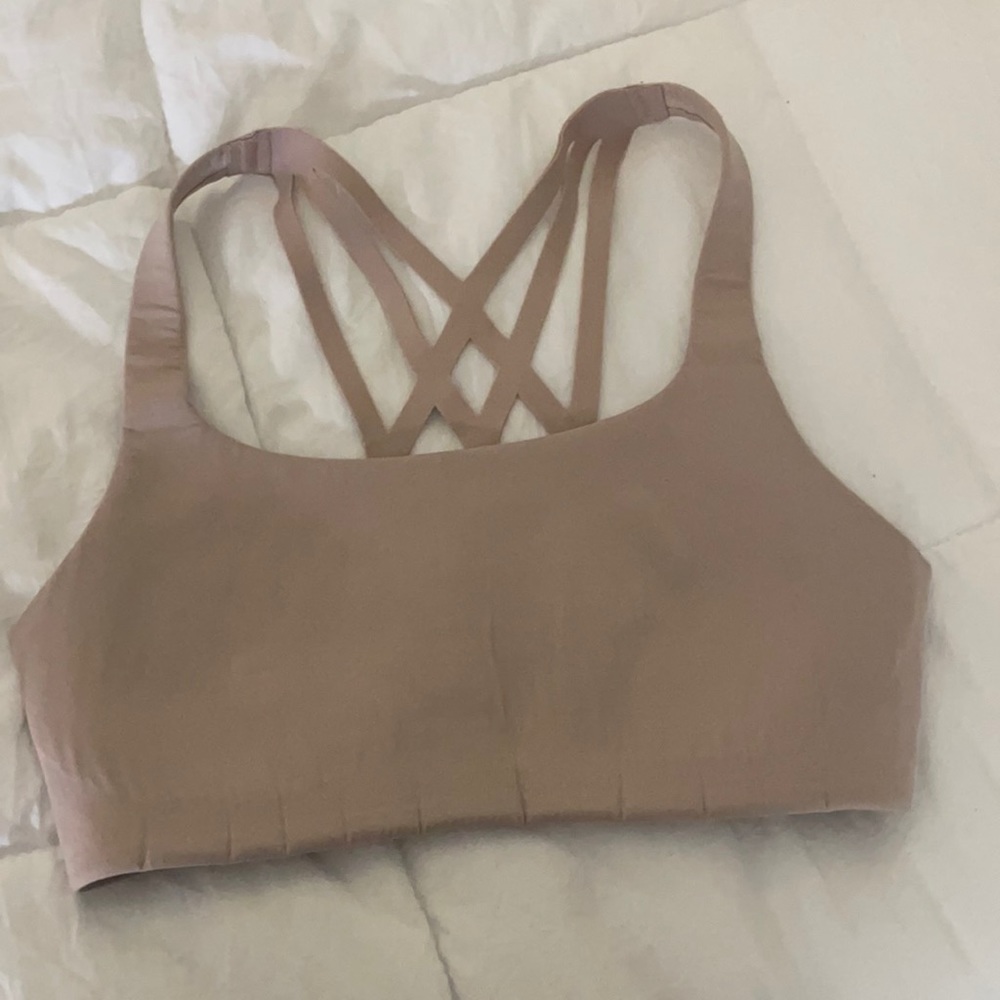 Light pink lululemon sports bra size 4
